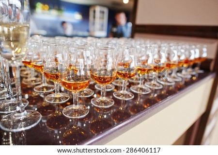 wine, champagne, cognac glasses on wedding reception