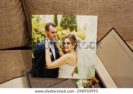 gray and brown textile velvet wedding book and album with picture
