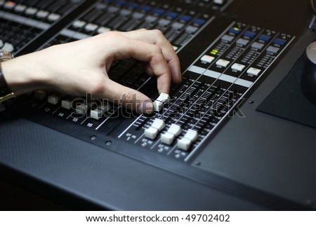 sound mixing console with hand