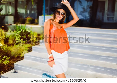 Elegant sexy young business woman brunette hair evening makeup wearing dress suit top skirt high heels shoes business clothes for meetings walks summer fall collection perfect body shape glasses