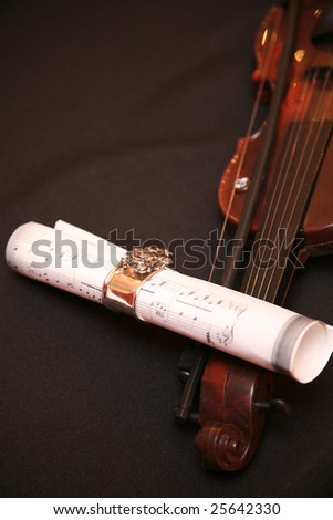 Violin with notes on a table