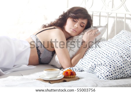 breakfast in bed. The girl in the bed