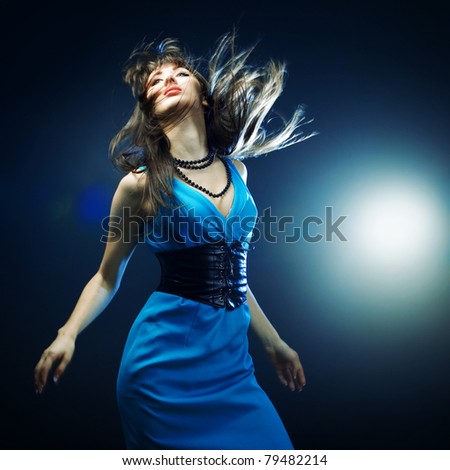 beautiful girl in a blue dress