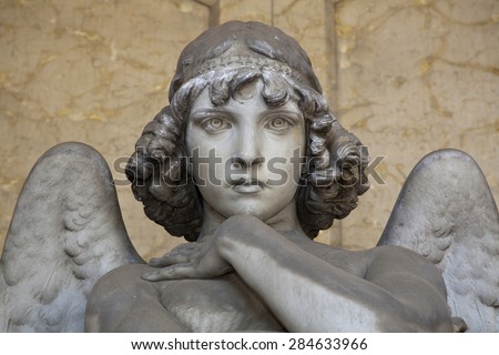 portrait of loving angel on marble,  monumental cemetery of Genoa, more than 100 years old statue