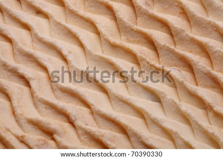 Ice-cream texture: peach. Appetizing ice-cream background