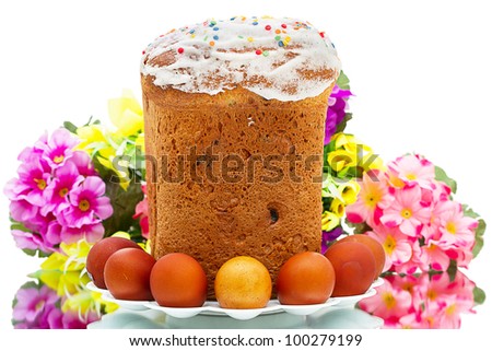Traditional an Easter cake and eggs on a white background