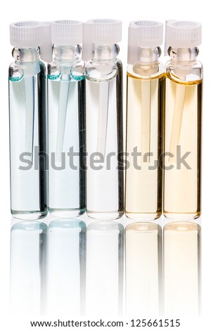 Five perfume samples  isolated on white background