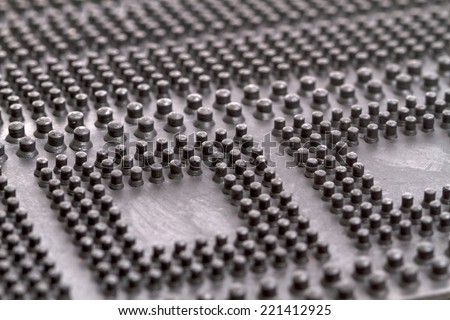 Closeup of the pattern of a black rubber floor mat