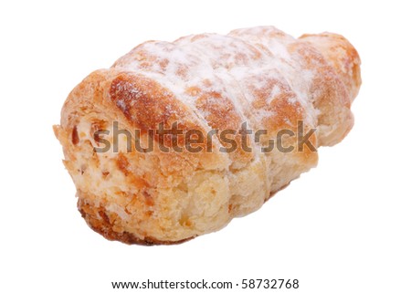 Cake in the form of tubes with whipped cream. Isolated on a white background.