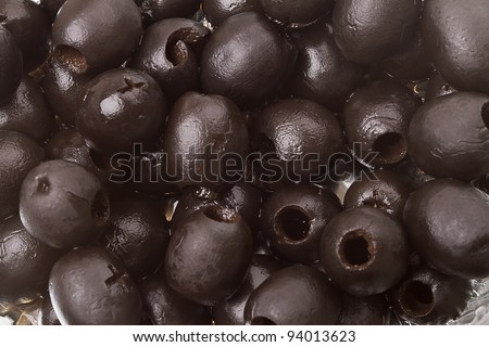 Background of black olives canned. Series of canned foods