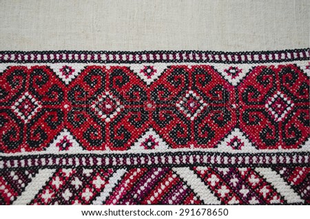 Embroidered cross pattern by border tablecloths on coarse cloth