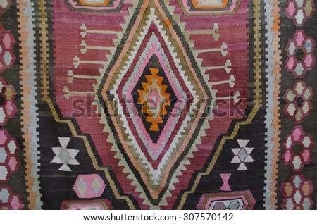 Central part of the wool rug with geometric pattern