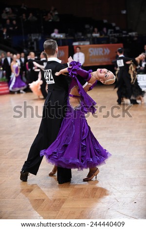 Stuttgart, Germany - August 16,2014: An unidentified dance couple in a dance pose during Grand Slam Standart at German Open Championship, on August 16, in Stuttgart, Germany