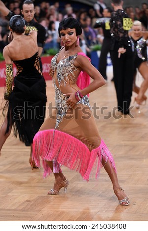 Stuttgart, Germany - August 16,2014: An unidentified female latin dancer  in a dance pose during Grand Slam Latin at German Open Championship, on August 16, in Stuttgart, Germany