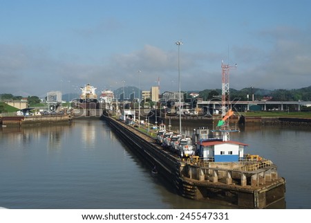 Panama canal, Panama-May 16, 2009: Gates and basin of GATUN LOCKS  of Panama canal filling to raise a ship. This is the first set of locks situated on the Atlantic entrance of the Panama Canal.