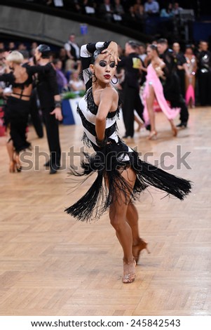 Stuttgart, Germany - August 16,2014: An unidentified female latin dancer in a dance pose during Grand Slam Latin at German Open Championship, on August 16, in Stuttgart, Germany
