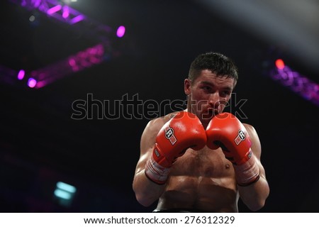 Kyiv, UKRAINE - April 18, 2015 : An unidentified boxers in the ring during fight for ranking points in the Palace of sport, Kiev, Ukraine