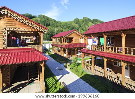 Beautiful wooden cottages in the mountains. Tourist complex \