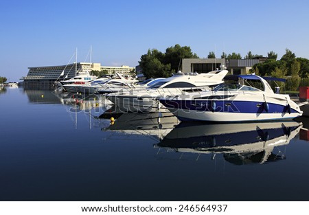 Sithonia, Greece - July 18, 2014: Beautiful yacht at the pier of Porto Carras Meliton. Largest private dock in northern Greece