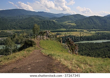 Kind from a mountain the Devil finger on the river of Katun. Altai. Russia.