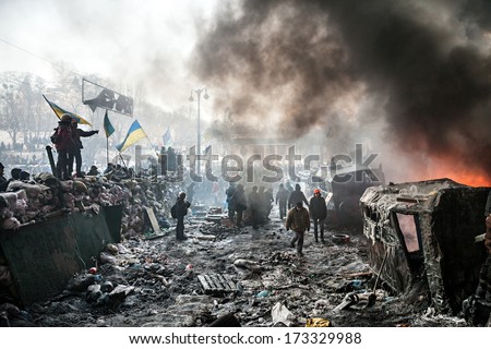 Kiev, Ukraine - January 25, 2014: Mass Anti-Government Protests In The Center Of Kiev. Barricades In The Conflict Zone On Hrushevskoho St.