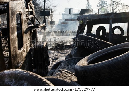 KIEV, UKRAINE - January 26, 2014: Mass anti-government protests in the center of Kiev. Government troops guarding the government district