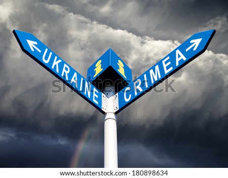 Ukrainian Russian conflict. Ukraine  and Crimea road sign. Political metaphor.