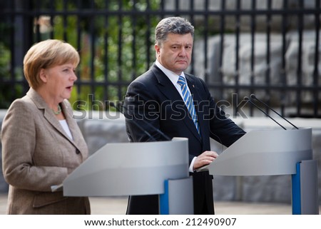 KIEV, UKRAINE - Aug 23, 2014: President of Ukraine Petro Poroshenko and Federal Chancellor of Germany Angela Merkel during a working visit to Ukraine