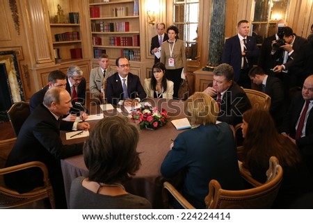 MILAN, ITALY - Oct 17, 2014: President Ukraine Poroshenko, German Chancellor Merkel, French President Hollande and Russian President Putin during a meeting on ASEM summit of European and Asian leaders