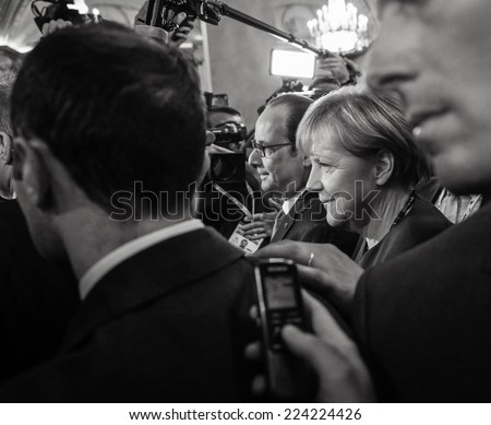 MILAN, ITALY - Oct 17, 2014: German Chancellor Angela Merkel and French President Francois Hollande after the meeting on the ASEM summit of European and Asian leaders in Milan