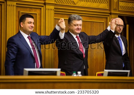 KIEV, UKRAINE - NOV 27, 2014: Chairman of the Verkhovna Rada of Ukraine Vladimir Groisman, president of Ukraine Petro Poroshenko and Ukrainian Prime Minister Arseniy Yatsenyuk