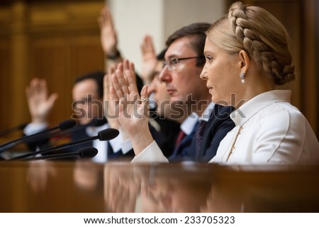 KIEV, UKRAINE - NOV 27, 2014: People\'s deputies of Ukraine Yuriy Lutsenko and Yulia Tymoshenko at the opening of the first session of the Verkhovna Rada of Ukraine VIII convocation