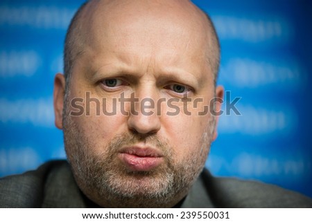 KIEV, UKRAINE  - DECEMBER 20, 2014: Secretary of the National Security and Defence Council of Ukraine Oleksandr Turchynov holds a breefing after ending of a meeting of NSDC