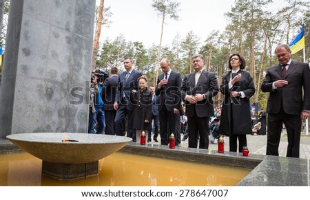KIEV, UKRAINE - May. 17, 2015: Participants in the ceremony of laying flowers to the Memorial Day of Victims of Political Repression in the National Historical Memorial Reserve \