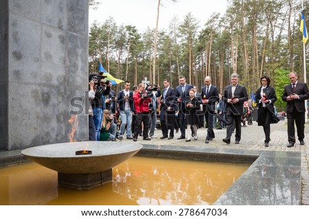 KIEV, UKRAINE - May. 17, 2015: Participants in the ceremony of laying flowers to the Memorial Day of Victims of Political Repression in the National Historical Memorial Reserve \