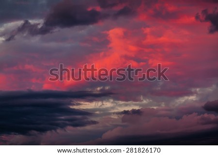 Abstract nature background. Dramatic and moody pink, purple and blue cloudy sunset sky