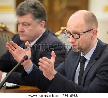 KIEV, UKRAINE - Jun 03, 2015: Prime Minister of Ukraine Arseniy Yatsenyuk and President of Ukraine Petro Poroshenko during a meeting of the National Council of the reforms in Kiev