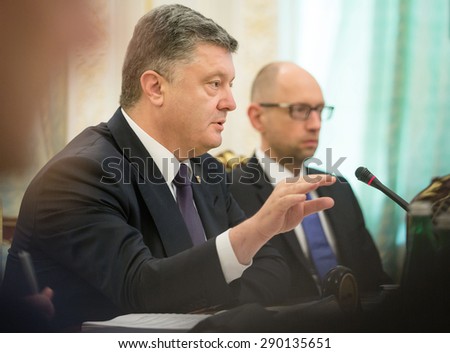 KIEV, UKRAINE - Jun 23, 2015: President of Ukraine Petro Poroshenko and the Prime Minister of Ukraine Arseniy Yatsenyuk during a meeting of the National Council of the reforms in Kiev