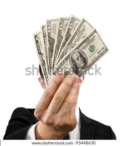 Fan of money in the hands in front of face