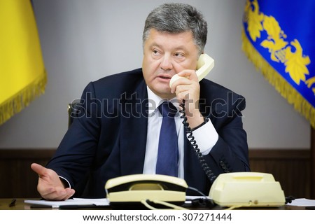 KIEV, UKRAINE - Aug 18, 2015:  President of Ukraine Petro Poroshenko helds a telephone conversation with President of the European Commission, Jean-Claude Juncker