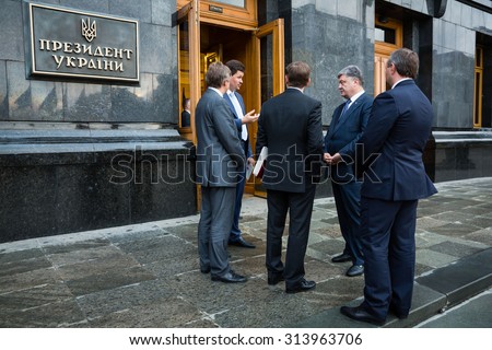 KIEV, UKRAINE - Sep 06, 2015: President Ukraine Petro Poroshenko, and president press secretary Svyatoslav Tsegolko while waiting for director of International Monetary Fund Christine Lagarde