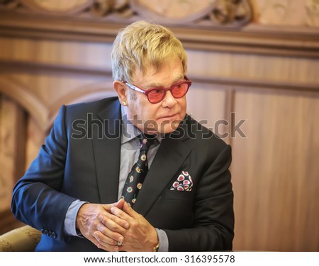 KIEV, UKRAINE - Sep 12, 2015: World-famous musician, composer and singer Elton John well-known in world for his charitable activity in fight against AIDS against his meeting with President of Ukraine