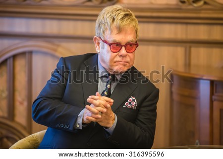 KIEV, UKRAINE - Sep 12, 2015: World-famous musician, composer and singer Elton John well-known in world for his charitable activity in fight against AIDS against his meeting with President of Ukraine