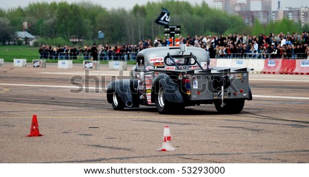 MINSK, BELARUS - MAY 01: Belarus Drag Racing Championship Round 1 - Competitors on start line ready for drag race in front of tribunes on May 01st 2010 in Minsk, Belarus
