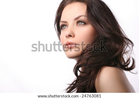 attractive young woman isolated on white looking away from camera