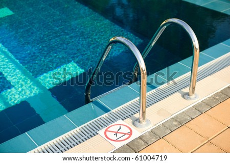 beautiful swimming pool with no swimming sign
