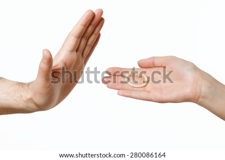 condom in female hand, men\'s hand showing stop