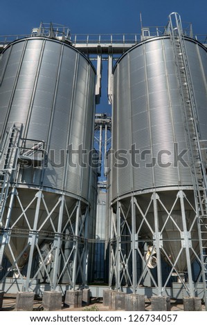 Galvanised Iron grain silos on a farm in Eastern Europe
