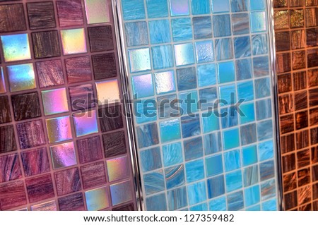 Three samples of mix shiny glass mosaic in blue and beige colors