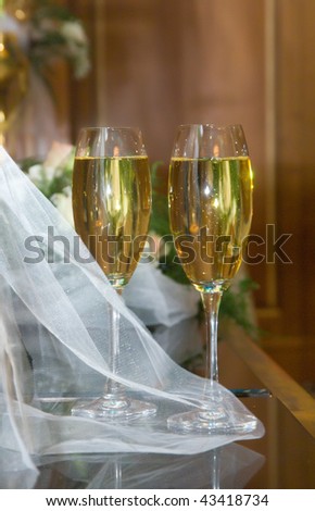 wedding champagne glasses standing on the table